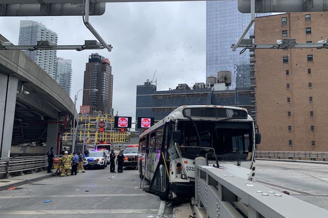 A NJ Transit bus struck a road divider outside the Port Authority terminal Saturday.